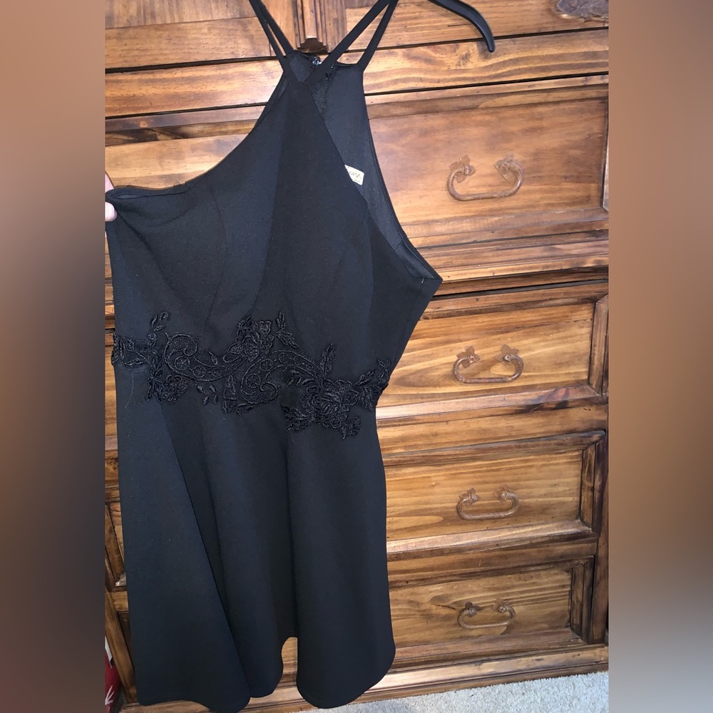 Mini Black dress made by Xtraordinary. Size 11